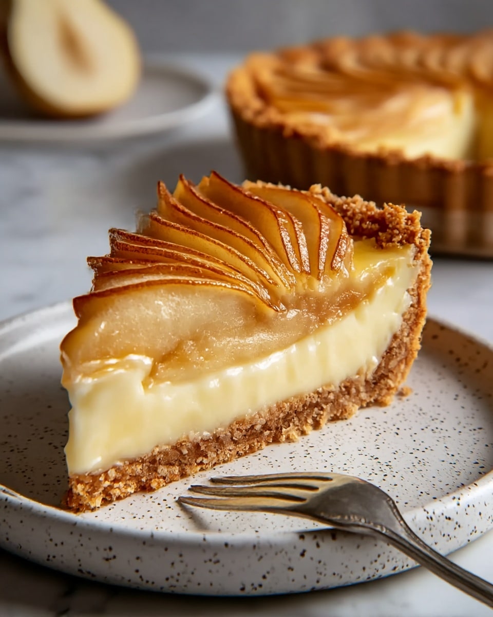 A slice of pie is shown on a white speckled plate with a silver fork beside it. The pie has three layers: the bottom layer is a light brown crumbly crust, the middle layer is a thick creamy pale yellow custard, and the top layer has thinly sliced golden-brown glazed pear arranged in a fanned pattern. In the background, part of the whole pie can be seen slightly blurred. The setting is on a white marbled surface. photo taken with an iphone --ar 4:5 --v 7